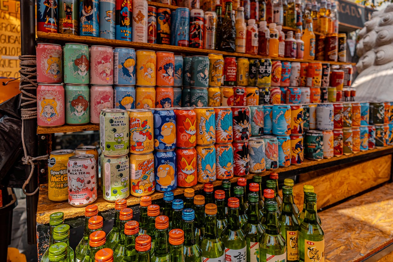 why-choose-us-02 Vibrant display of Korean drinks and sodas at a bustling market in Mexico City.